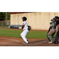 Adrian Rondon of the Burlington Bees watches his RBI double