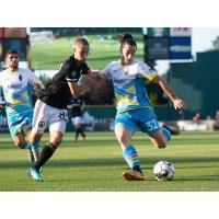 Las Vegas Lights FC defender Jonathan Levin (right) vs. Tacoma Defiance