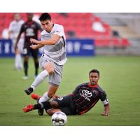 Sacramento Republic FC fights through a tackle by San Antonio FC