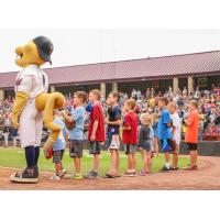 Kids with Fang, the mascot of the Wisconsin Timber Rattlers