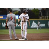 Jaycob Brugman of the Tacoma Rainiers on base