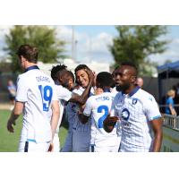 FC Edmonton celebrates a goal vs. York 9 FC