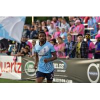 Forward Madison FC defender Carter Manley