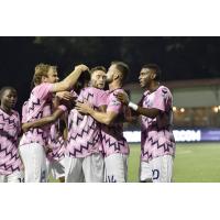 Forward Madison FC celebrates a goal against the Milwaukee Torrent