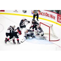 Prince George Cougars battle in front of the Vancouver Giants net