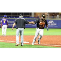 Deibinson Romero of the Long Island Ducks rounds the bases
