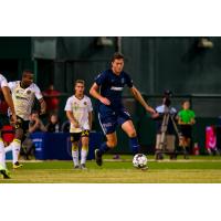 Elliot Collier of Memphis 901 FC eyes the ball against Pittsburgh Riverhounds SC