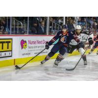 Vancouver Giants centre Justin Sourdif (right) against the Kamloops Blazers