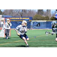 Defenseman Logan Monroe with Canisius College