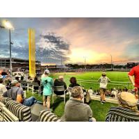 Fans enjoy the outfield view at Segra Stadium, home of the Fayetteville Woodpeckers