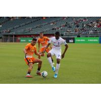 Forward Madison FC forward Josiel Nunez (right) vs. Lansing Ignite