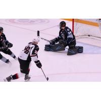 Justin Lies of the Vancouver Giants scores against the Winnipeg ICE