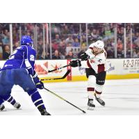 Cleveland Monsters center Ryan MacInnis takes a shot against the Syracuse Crunch