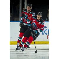 Kelowna Rockets left wing Dillon Hamaliuk (front)