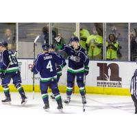 Maine Mariners defenseman Zach Tolkinen celebrates with his teammates