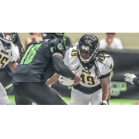 Linebacker Fred Williams (right) with the Carolina Energy