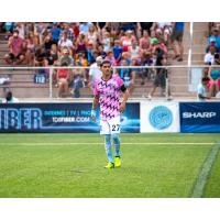 Forward Madison FC defender Christian 