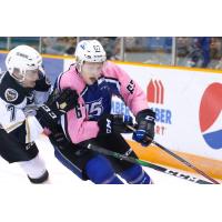 Saint John Sea Dogs left wing Dawson Stairs (in pink) vs. the Charlottetown Islanders