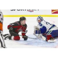 Vancouver Giants center Tristen Nielsen (left) vs. the Swift Current Broncos