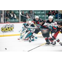 Kelowna Rockets goaltender Roman Basran and his defense against the Prince George Cougars