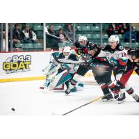 Prince George Cougars pressure the Kelowna Rockets