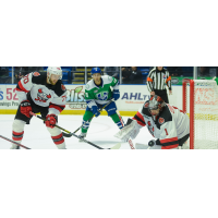 Binghamton Devils defenseman Joe Morrow (left) vs. the Utica Comets