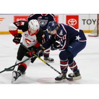 Prince George Cougars left wing Josh Maser (left) against the Tri-City Americans