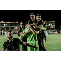 Phoenix Rising celebrate a playoff win