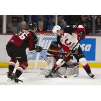 Vancouver Giants defenceman Kaleb Bulych defends against the Prince George Cougars
