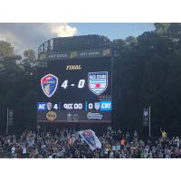 North Carolina Courage fans celebrate the final score at the NWSL Championship Game