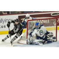 Vancouver Giants defenceman Bowen Byram (left) vs. the Swift Current Broncos