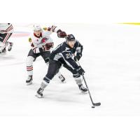 Jake Dotchin of the San Antonio Rampage handles the puck against the Rockford IceHogs