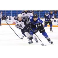 Saint John Sea Dogs left wing James White (right) vs. the Rimouski Oceanic