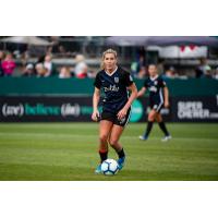 Reign FC midfielder Allie Long