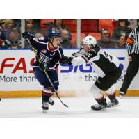 Vancouver Giants defenceman Kaleb Bulych (right) vs. the Tri-City Americans