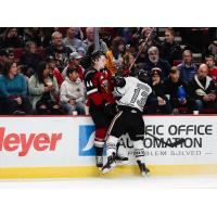 Vancouver Giants defenceman Bowen Byram (left) vs. the Portland Winterhawks