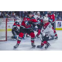 Kelowna Rockets center Ethan Ernst takes on the Kamloops Blazers