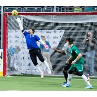 Dallas Sidekicks lunge to make a save against the St. Louis Ambush in preseason play