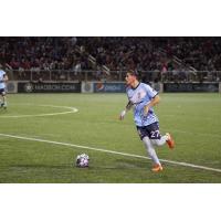 Forward Madison FC defender Christian 