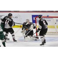 Vancouver Giants goaltender David Tendeck deflects a shot