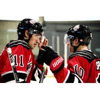 Jared Gomes (11) and Lindsay Sparks (10) of the Brampton Beast