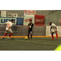 Kansas City Comets defenders close in on the Turlock Cal Express