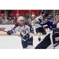 Vancouver Giants defenceman Alex Kannok Leipert (left) vs. the Tri-City Americans