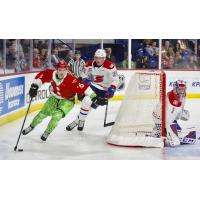 Vancouver Giants centre Cole Shepard handles the puck in back of the Spokane Chiefs goal