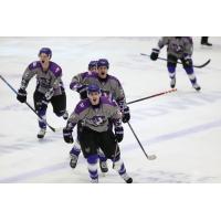 Tri-City Storm react after a goal