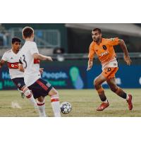 Forward Pato Botello-Faz (right) with Lansing Ignite