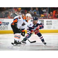 Lehigh Valley Phantoms left wing Greg Carey (left) against the Hartford Wolf Pack