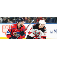Binghamton Devils center Egor Sharangovich (right) vs. the Springfield Thunderbirds