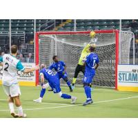 St. Louis Ambush forward Tony Walls watches his shot head toward the Kansas City Comets goal