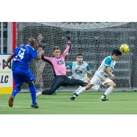 Kansas City Comets forward Leo Gibson (left) vs. the St. Louis Ambush